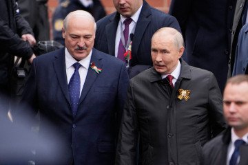 Russian leader Vladimir Putin and Belarusian leader Alexander Lukashenko attend the Victory Day military parade at Red Square in central Moscow on May 9, 2026. (Source: Getty Images)