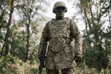 A Ukrainian soldier wears a new fragmentation-resistant protective suit featuring additional armor for the arms, abdomen, pelvis, and upper thighs. (Source: Ministry of Defense of Ukraine) A Ukrainian soldier wears a new fragmentation-resistant protective suit featuring additional armor for the arms, abdomen, pelvis, and upper thighs. (Source: Ministry of Defense of Ukraine)