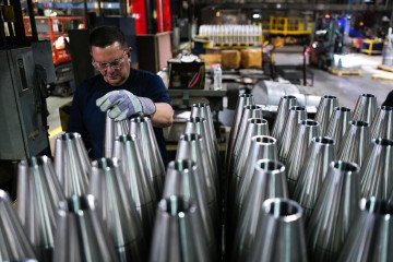 Trump Signals First-Ever Approval for Ukraine Missile Production, Zelenskyy Says An employee handles 155 mm caliber shells after the manufacturing process. (Source: Getty Images)