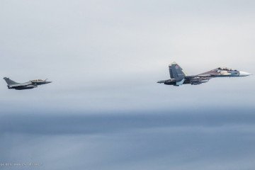 French Air Force Rafale fighter escorts a Russian Su-30SM during a NATO Baltic Air Policing interception mission. (Source: France’s Armed Forces General Staff) French Air Force Rafale fighter escorts a Russian Su-30SM during a NATO Baltic Air Policing interception mission. (Source: France’s Armed Forces General Staff)