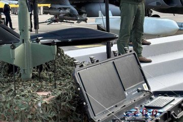 Control station and interceptor drone from Franco-Ukrainian defense firm Alta Ares, displayed alongside a turbojet-powered drone at an airbase during a joint military demonstration. (Source: Alta Ares)