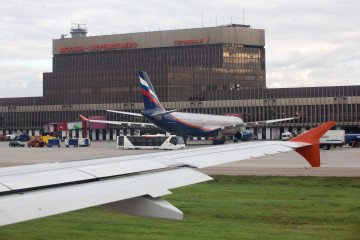 Passenger aircraft operated by OAO Aeroflot stand near the Terminal F building at Sheremetyevo airport in Moscow, Russia. (Source: Getty Images)