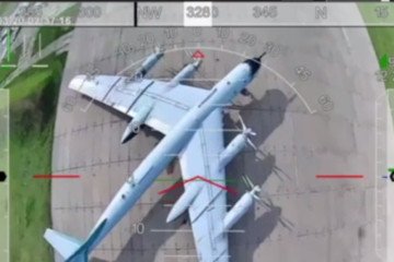 Russian Tu-95MS strategic bomber moments before a Ukrainian FPV-drone strike, 2025. Russian Tu-95MS strategic bomber moments before a Ukrainian FPV-drone strike, 2025.