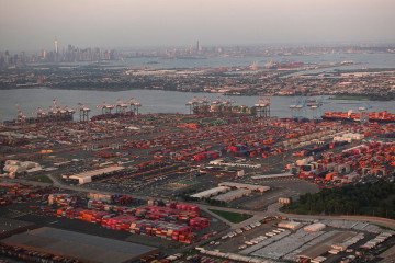 An aerial view of cargo ships being unloaded at Port Newark, in Newark, New Jersey, in front of the skyline of lower Manhattan in New York City on August 8, 2026. (Source: Getty Images) An aerial view of cargo ships being unloaded at Port Newark, in Newark, New Jersey, in front of the skyline of lower Manhattan in New York City on August 8, 2026. (Source: Getty Images)