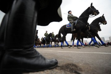 Horsemen of Russia’s elite presidential regiment take part in parade rehearsals on Red Square, October 2011. (AFP/Getty Images)