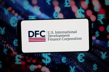 The logo of US finance development corporation DFC is displayed on a smartphone in front of abstract background on computer screen. (Source: Getty Images) The logo of US finance development corporation DFC is displayed on a smartphone in front of abstract background on computer screen. (Source: Getty Images)