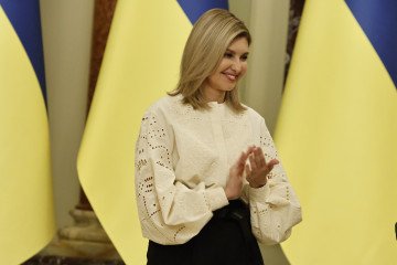 First Lady Olena Zelenska applauds during the ceremony, which took place on National Flag Day on August 23, 2023 in Kyiv, Ukraine.