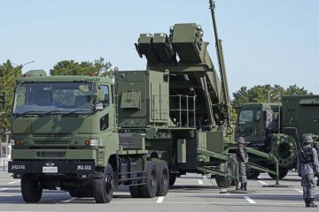 The Japan Air Self-Defense Force conducts a drill for the deployment of Patriot Advanced Capability-3 surface-to-air missile interceptors at a parking lot in Fukuoka, southwestern Japan. (Source: Getty Images) The Japan Air Self-Defense Force conducts a drill for the deployment of Patriot Advanced Capability-3 surface-to-air missile interceptors at a parking lot in Fukuoka, southwestern Japan. (Source: Getty Images)
