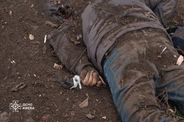 A deceased civilian lies in the dirt following a Russian airstrike on Kyiv. (Source: Kyiv Emergency Services)