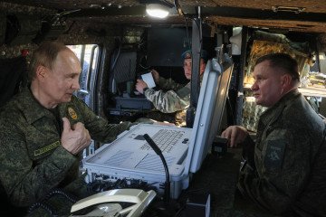 Russian leader Vladimir Putin inspects the Zapad-2025 joint Russian-Belarusian military drills at a training ground in the Nizhny Novgorod region on September 16, 2025. (Source: Getty Images)