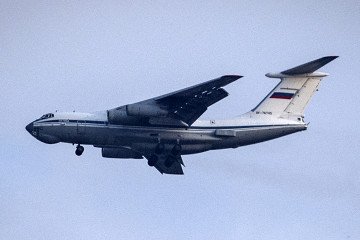 A Russian Air Force Ilyushin IL-76 transport airplane flies above the countryside near the city of Qamishli in Syria's northeastern Hasakah province on October 25, 2019. Illustrative photo. (Source: Getty Images)
