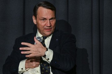 qué significa otan que moneda se usa en polonia