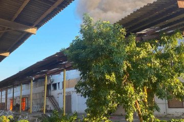 A fire burns at a Ukrainian Red Cross warehouse in Kherson following a Russian drone attack on August 23, 2026. (Source: Ukrainian Red Cross)