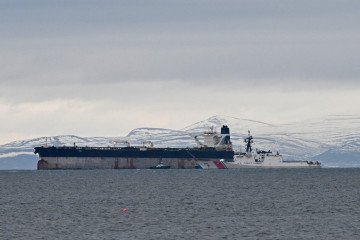 Illustrative image. An oil tanker, Marinera, is pictured alongside a US Coast Guard ship at sea in the Moray Firth, northern Scotland, on January 14, 2026. (Source: Getty Images)