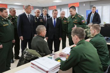 Russia’s Security Council Deputy Chairman Dmitry Medvedev visits a contract service enlistment office in Ufa on December 24, 2024. (Source: Getty Images)