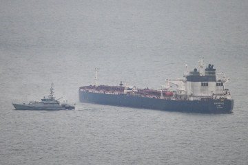 A border security vessel patrols the detained Smyrtos vessel outside the harbour, on June 15, 2026 in Portland, England. Illustrative photo. (Source: Getty Images)