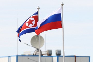 Rusian and North Korean flags waving at the Vostochny Cosmodrome in Amur region on September 13, 2023. (Source: Getty Images)