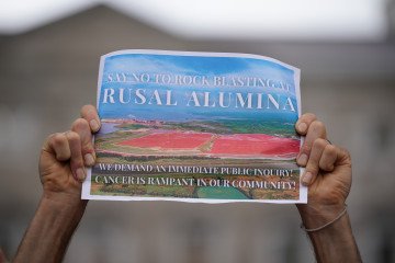 Activists from Future Proof Clare protest outside Leinster House in Dublin against the Aughinish Alumina plant owned by Rusal. (Source: Getty Images)