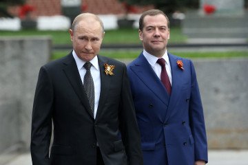 Russian leader Vladimir Putin and Dmitry Medvedev attend the Victory Day Parade in Moscow’s Red Square on May 9, 2019. (Source: Getty Images)
