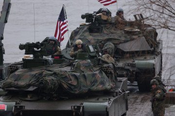 M1A2 Abrams main battle tanks of the US Army arrive on M3 amphibious rigs of the German/British Amphibious Engineer Battalion 130, crossing the Vistula River during the NATO Dragon 24 exercise on March 05, 2024, near Gniew, Poland. (Source: Getty Images) M1A2 Abrams main battle tanks of the US Army arrive on M3 amphibious rigs of the German/British Amphibious Engineer Battalion 130, crossing the Vistula River during the NATO Dragon 24 exercise on March 05, 2024, near Gniew, Poland. (Source: Getty Images)