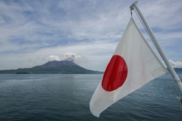The Japanese flag flies off the back of the Japan Coast Guard ship “Asanagi”, on June 20, 2025. The Japanese flag flies off the back of the Japan Coast Guard ship “Asanagi”, on June 20, 2025.