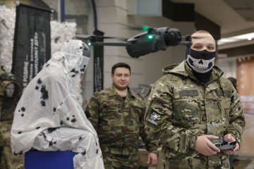 Shaman, the 19-year-old drone operator, flies a quadcopter drone during a demonstration event in Voronezh, Russia. (Source: Getty Images)