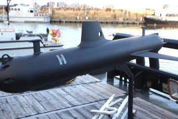 A life-size autonomous underwater glider called SG-1 Fathom is seen at the unveiling of the Atlantic Bastion programme on December 4, 2025, in Portsmouth, England. (Source: Getty Images)