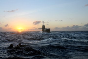US Navy SEALs return to USS Michigan (SSGN 727) during undersea special ops training in the Pacific. (Source: Getty Images)