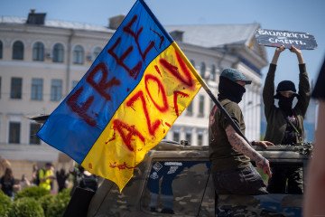 Activists and relatives of Ukrainian POWs hold up banners and urge for the return of Ukrainian soldiers from Russian captivity on May 19, 2024 in Kyiv, Ukraine. (Source: Getty Images)