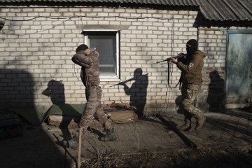 Ukrainian soldiers of the 93rd Brigade with captured Russian troops on the frontline in Donetsk region, Ukraine, March 9, 2026. (Source: Getty Images)