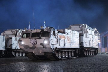 Russian Arctic-configured Tor-M2DT surface-to-air missile systems on DT-30 tracked platforms during a military parade. (Photo: Russian media)