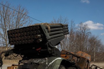 Illustrative image. A destroyed Russian BM-21 Grad MLRS vehicle with ammunition is seen in the Kyiv region, 2022.