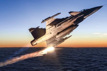 Swedish Jas 39 Gripen C fighter jet. Swedish Jas 39 Gripen C fighter jet.