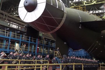 Russian naval officers stand in front of the Khabarovsk nuclear submarine during its launch ceremony at the Sevmash shipyard in Severodvinsk, near the Finnish border. (Source: Russian Ministry of Defense)