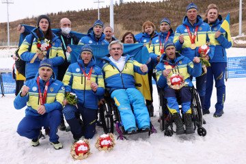 Ukrainian team poses with their gold medals following the Para Cross-Country Open 4x2.5km Relay during day nine of the Beijing 2022 Winter Paralympics. (Source: Getty Images)