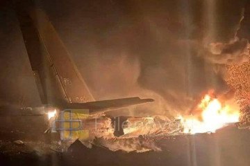 Tail of the crashed Russian Tu-95 strategic bomber. (Source: Exilenova+) Tail of the crashed Russian Tu-95 strategic bomber. (Source: Exilenova+)