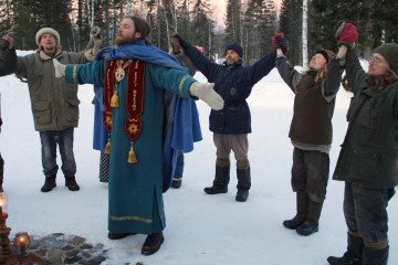 Inhabitants of Sun City in eastern Siberia pray. (Source: Getty Images) Inhabitants of Sun City in eastern Siberia pray. (Source: Getty Images)