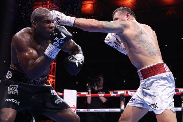 Oleksandr Usyk punches Daniel Dubois during their IBF, IBO, WBC and WBO World Heavyweight titles' fight at Wembley Stadium on July 19, 2025 in London, England. (Photo: Getty Images)