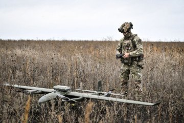 A soldier from a separate task force rifle battalion of the National Police of Ukraine in the Zaporizhzhia region holding a remote controller stands in the field near a GARA UAV in the Donetsk region, Ukraine on October 16, 2026. (Source: Getty Images) A soldier from a separate task force rifle battalion of the National Police of Ukraine in the Zaporizhzhia region holding a remote controller stands in the field near a GARA UAV in the Donetsk region, Ukraine on October 16, 2026. (Source: Getty Images)