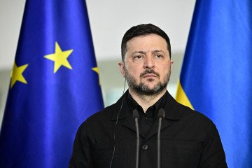 Ukrainian President Volodymyr Zelenskyy attends a joint press conference with the German Chancellor at the Chancellery in Berlin on April 14, 2026. (Source: Getty Images)