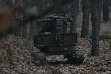 ARDAL mobile ground robotic platform with BUREVII robotic turret featuring a Mk 19 automatic grenade launcher. Illustrative photo. (Source: Frontline Robotics) ARDAL mobile ground robotic platform with BUREVII robotic turret featuring a Mk 19 automatic grenade launcher. Illustrative photo. (Source: Frontline Robotics)