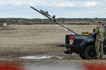 A US Army soldier launches an AS3 Surveyor interceptor drone, part of the MEROPS US counter-drone system, during a live-fire demonstration at the Deba training grounds in Subcarpathian Voivodeship, Poland, on November 18, 2025. (Source: Getty Images)