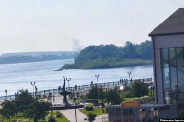 Smoke rises in the distance following a reported Ukrainian strike on the Prioritet fuel reserve facility in Russia's Udmurt Republic, July 27, 2026. (Source: Supernova+)