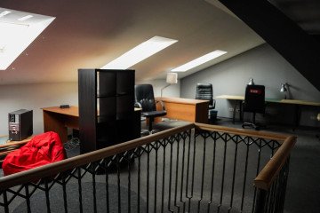 An upper-floor office area with multiple desks and skylights in the confiscated apartment. (Source: State Property Fund of Ukraine) An upper-floor office area with multiple desks and skylights in the confiscated apartment. (Source: State Property Fund of Ukraine)