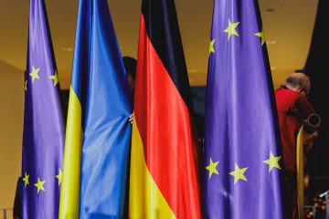 The Ukrainian flag is built up between the German flag and the flag of the European Union in Berlin, Germany. (Source: Getty Images)