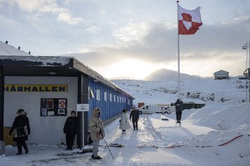 Residents wait for the polling station to open, in Nuuk, Greenland, on March 24, 2026 during the parliamentary election in Denmark. (Source: Getty Images)