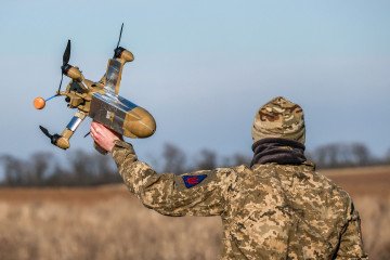 A Ukrainian soldier from the Khanter interceptor drone unit of the 208th Kherson Anti-Aircraft Missile Brigade holds an interceptor drone during a combat mission, March 4, 2026. Illustrative photo. (Source: Getty Images)