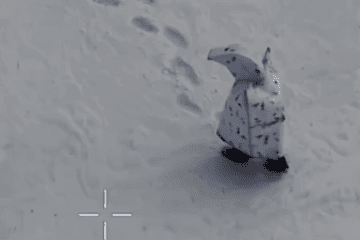 Russian camouflaged soldier moments before being hit by an FPV drone. (Source: 120th Territorial Defense Brigade)