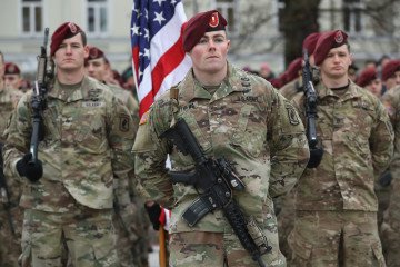 Soldiers of the US 173rd Airborne Brigade prepare to participate in a parade in the city center during the Iron Sword multinational military exercises on November 23, 2016, in Vilnius, Lithuania.