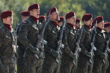 Polish soldiers participate in the official celebrations of the 6th Airborne Brigade Day at the Polish Aviation Museum in Krakow, Poland, on October 3, 2025. (Source: Getty Images)